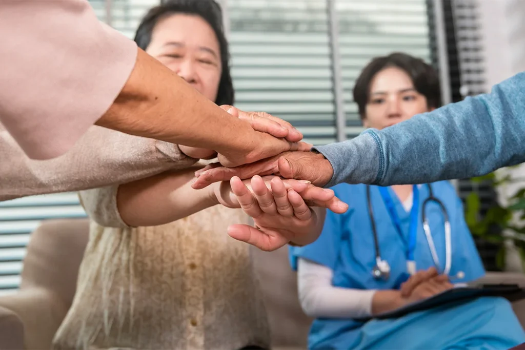 group of asian senior people are given advice