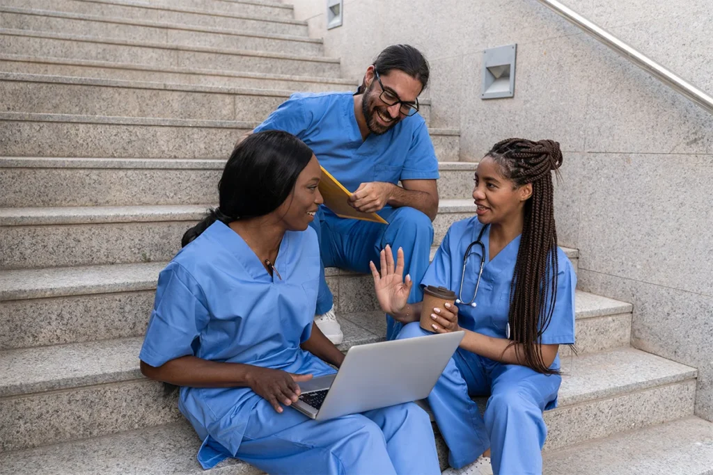 multiracial medical students studying together
