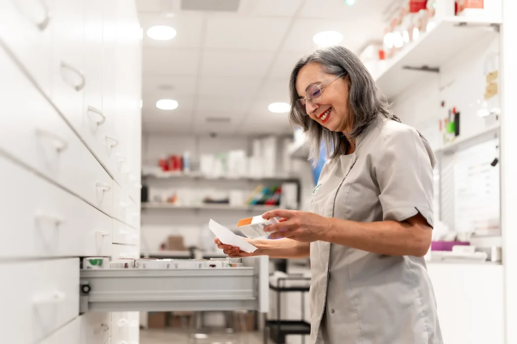 woman searching medicines in the storage room